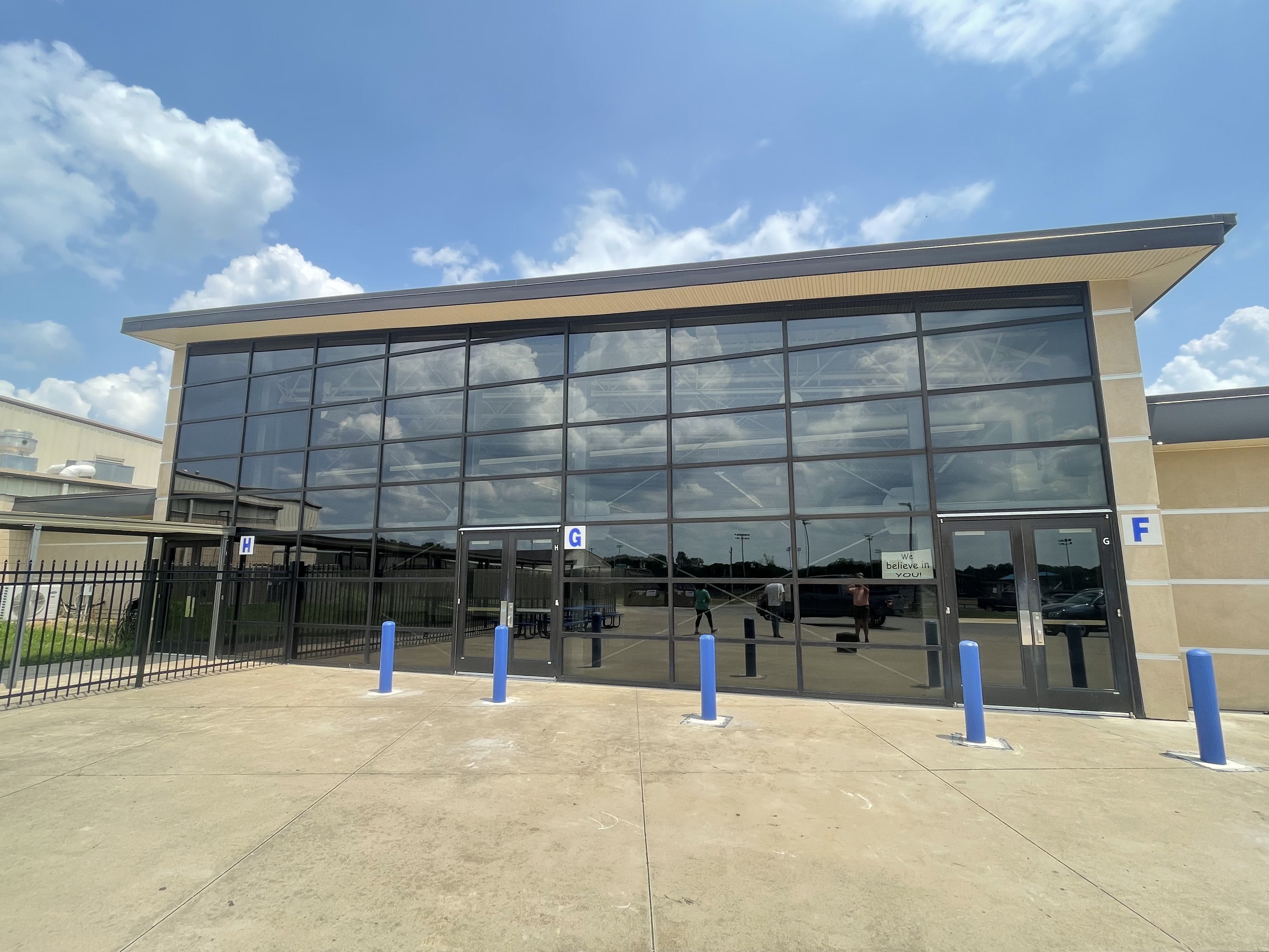 Commercial glass wall before screen installation