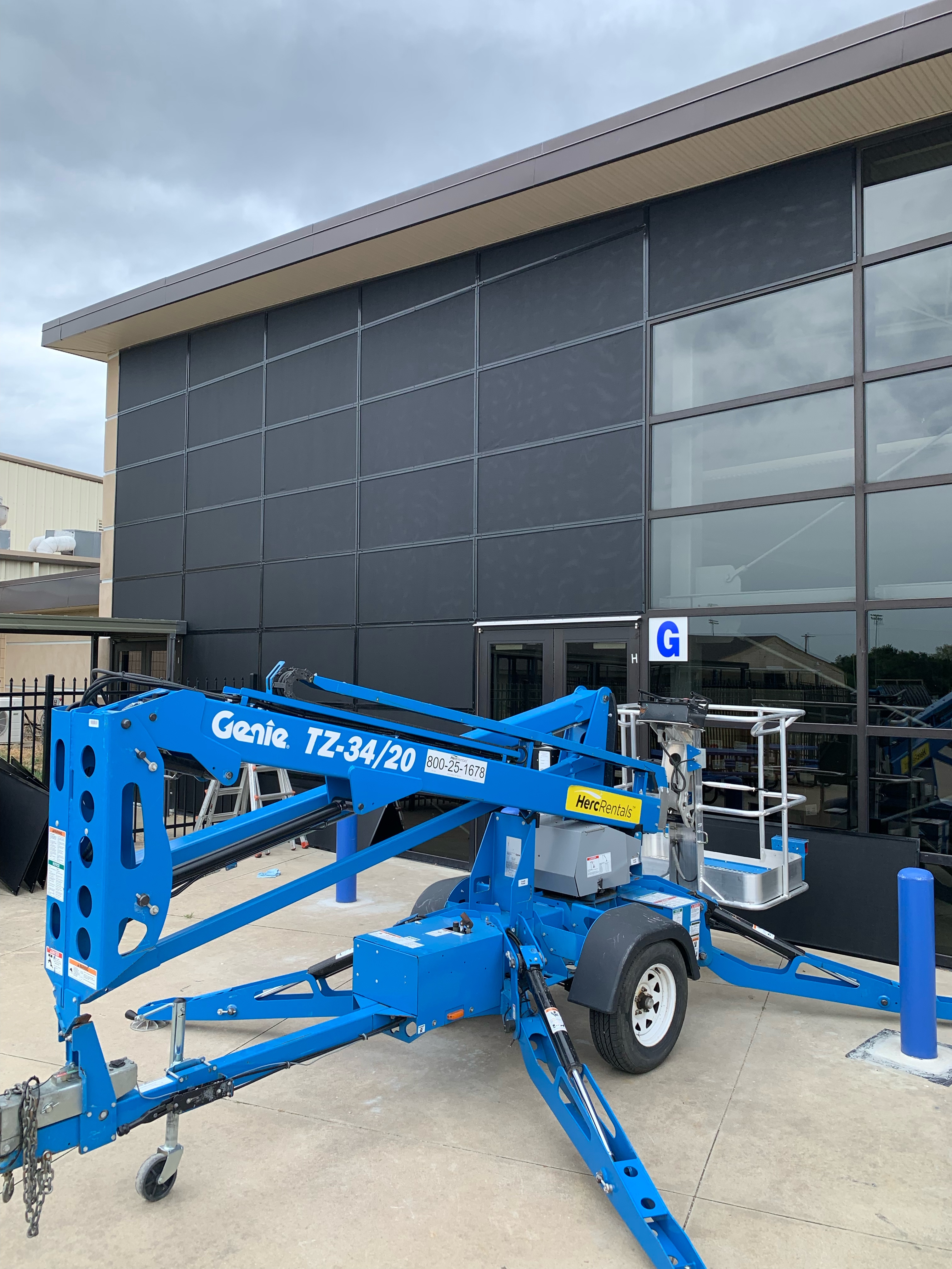 Commercial screen installation at height